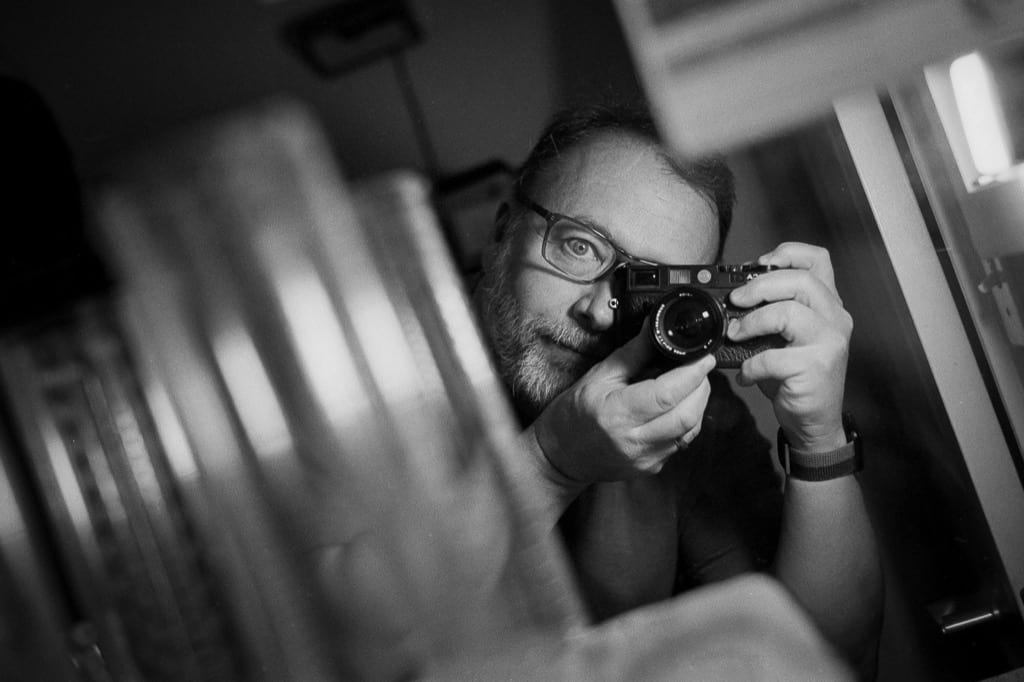 Self-portrait in mirror, Leica M6